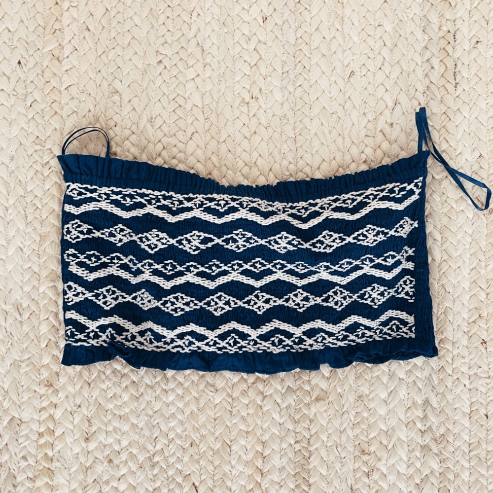 Blue crop top with white embroidery